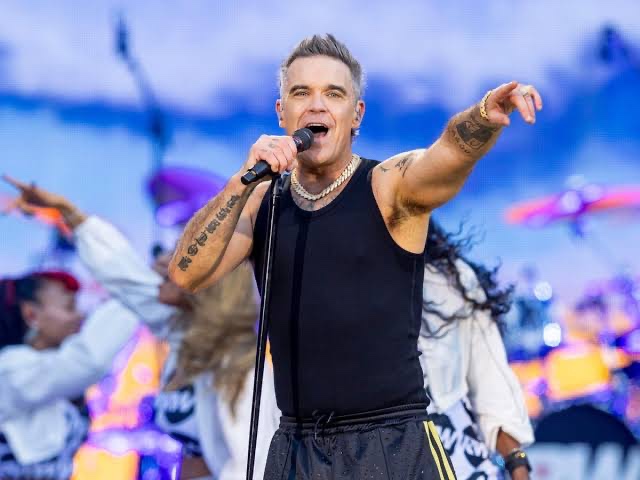 Robbie Williams Returns with Dazzling Stadium Show